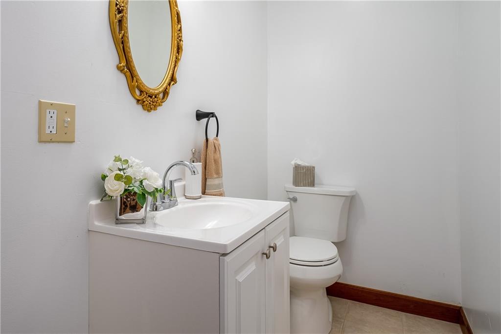 149 Three Degree Road Pittsburgh, PA 15237 - Photo 20 of 50 a bathroom with a toilet sink and mirror