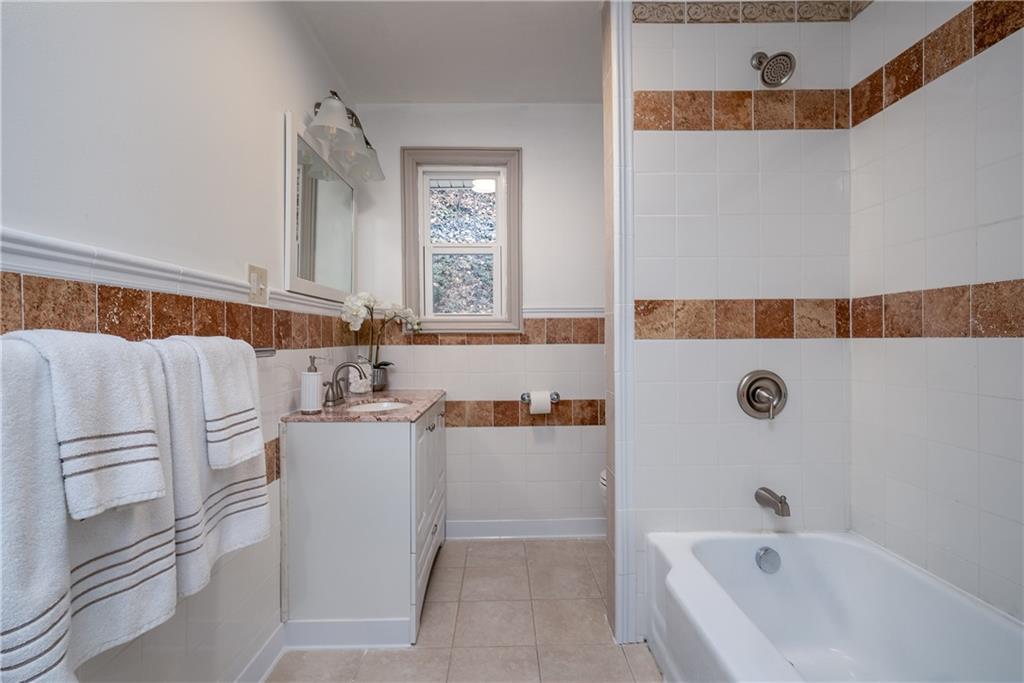 149 Three Degree Road Pittsburgh, PA 15237 - Photo 23 of 50 a bathroom with a bathtub and a sink