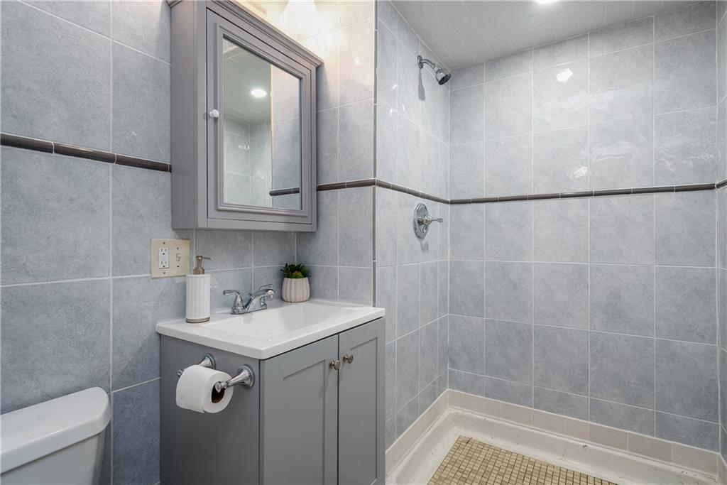 149 Three Degree Road Pittsburgh, PA 15237 - Photo 41 of 50 a bathroom with a sink and mirror