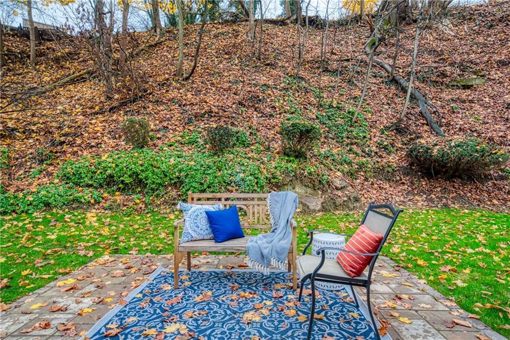 149 Three Degree Road Pittsburgh, PA 15237 - Photo 42 of 50 a backyard of a house with outdoor seating