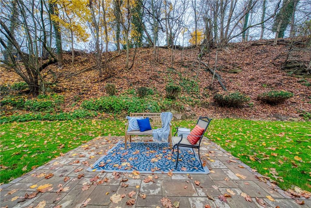 149 Three Degree Road Pittsburgh, PA 15237 - Photo 43 of 50 a backyard with chairs and a fire pit
