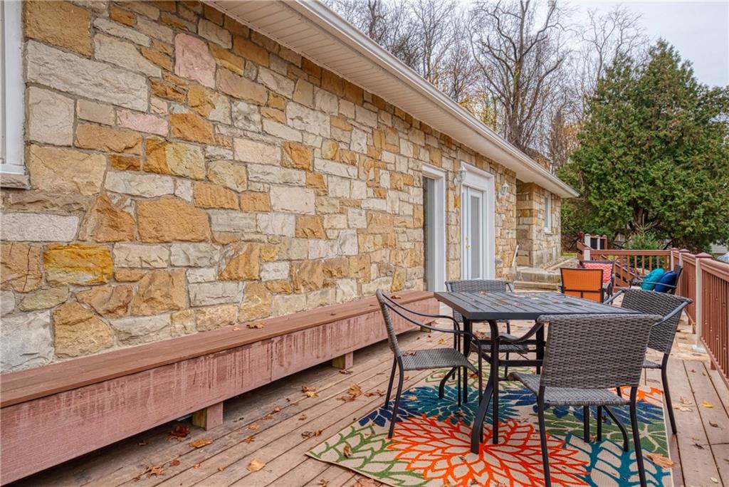 149 Three Degree Road Pittsburgh, PA 15237 - Photo 48 of 50 a view of a patio with table and chairs and wooden floor