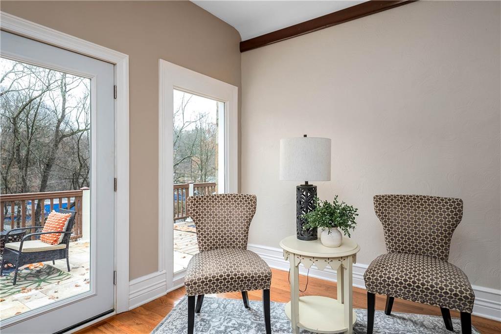 149 Three Degree Road Pittsburgh, PA 15237 - Photo 8 of 50 a living room with furniture and a floor to ceiling window
