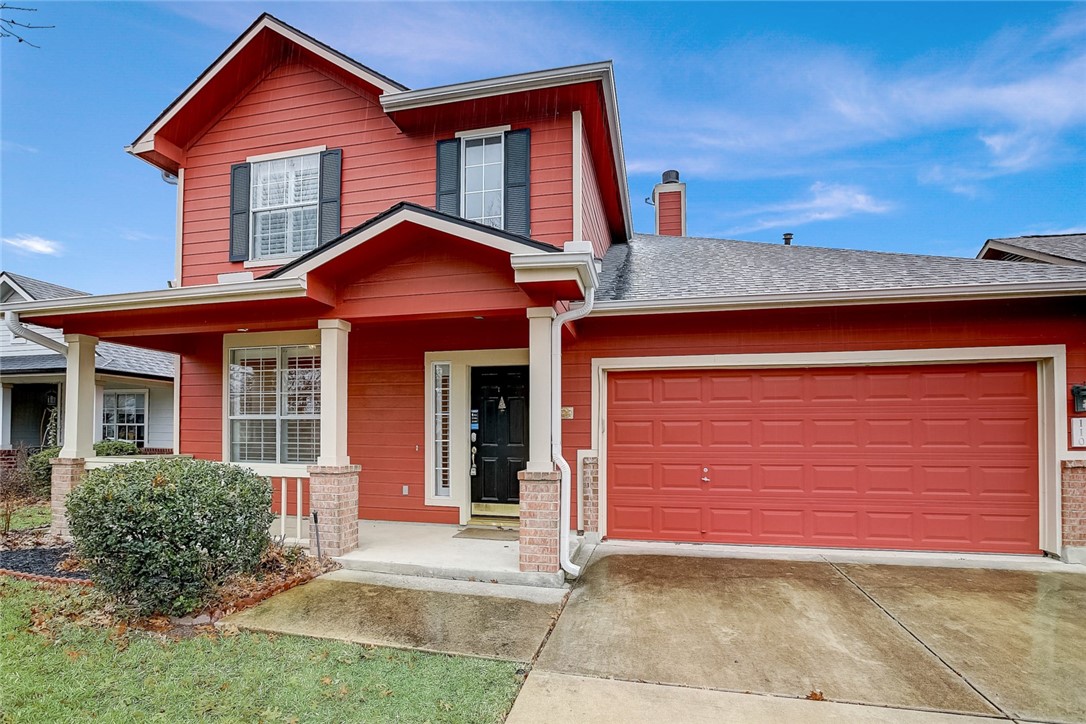 110 Village Commons Boulevard Georgetown, TX 78633 - Photo 1 of 1 a front view of a house with a yard and garage