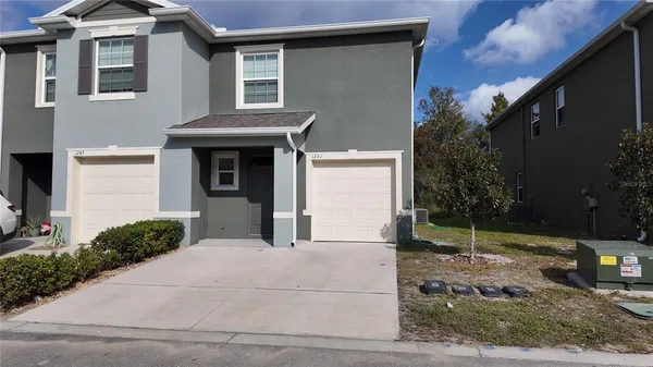 a house with trees in front of it