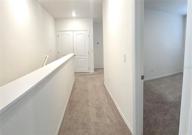 a view of a house with a swimming pool