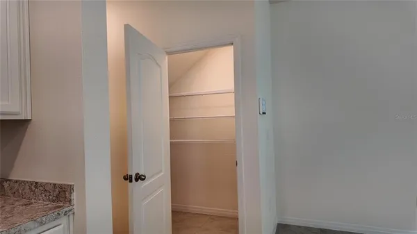 a bathroom with a glass door shower