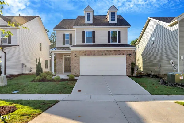 front view of house with a yard