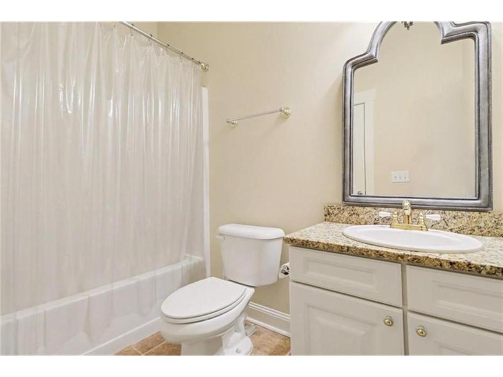 53 Pinto Place Jasper, GA 30143 - Photo 38 of 62 a bathroom with a granite countertop sink toilet and mirror