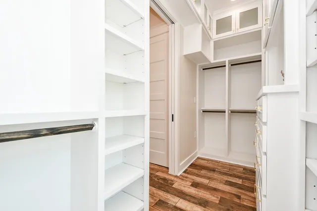 a view of an empty walk in closet