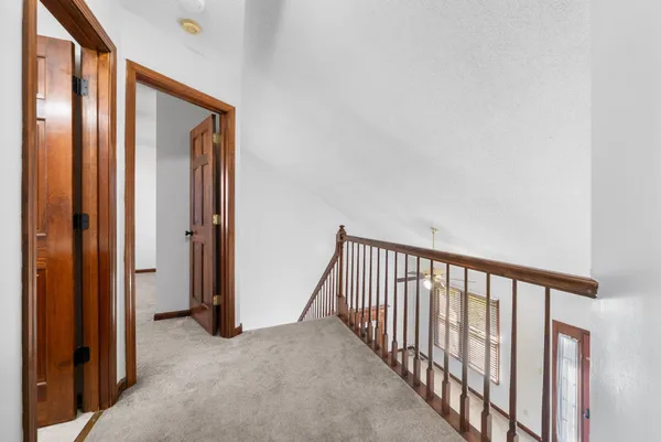 a view of a hallway with entryway