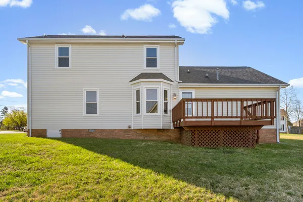 a view of a house with a big yard