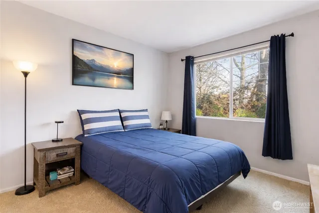 a bedroom with a bed and furniture