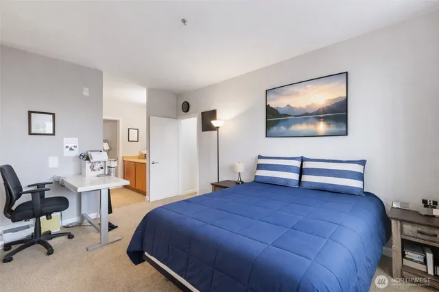 a bathroom with a sink double vanity and a toilet