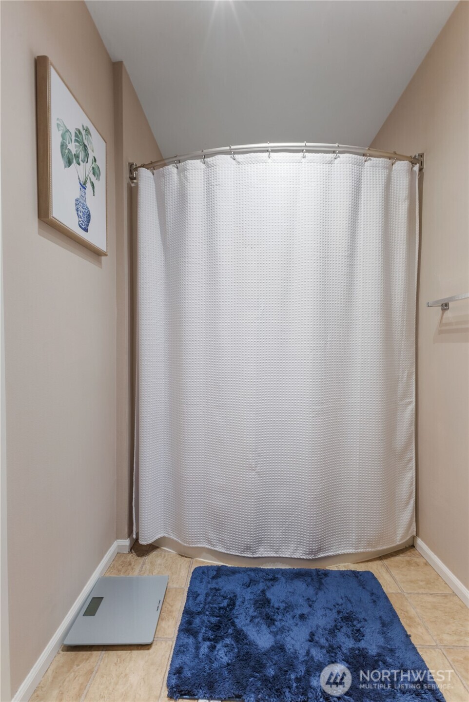 21430 40th Place South, Unit A Seattle, WA 98198 - Photo 21 of 27 a view of a room with wooden floor and a window