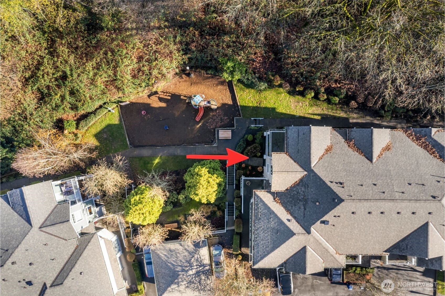 21430 40th Place South, Unit A Seattle, WA 98198 - Photo 24 of 27 an aerial view of a house with a yard swimming pool and outdoor seating