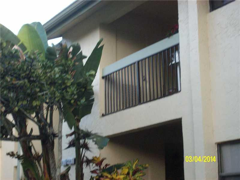 4435 Northwest 22nd Road, Unit 418 Coconut Creek, FL 33066 - Photo 5 of 15 Exterior Front