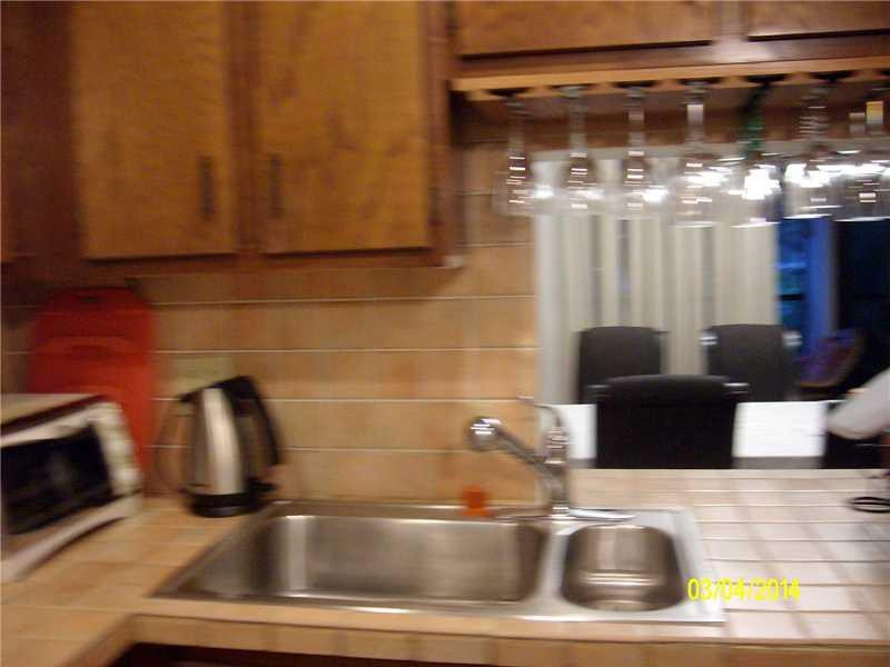 4435 Northwest 22nd Road, Unit 418 Coconut Creek, FL 33066 - Photo 8 of 15 Kitchen