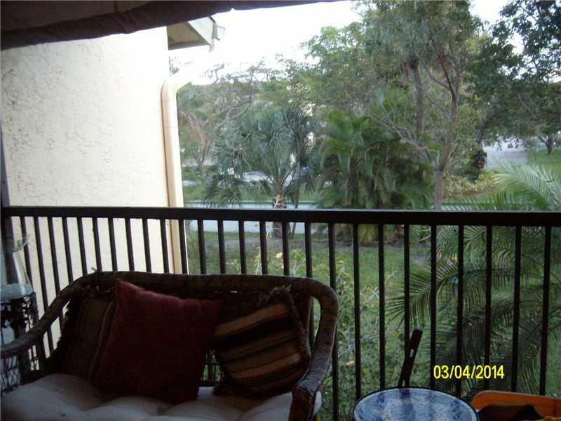 4435 Northwest 22nd Road, Unit 418 Coconut Creek, FL 33066 - Photo 9 of 15 Patio/Deck