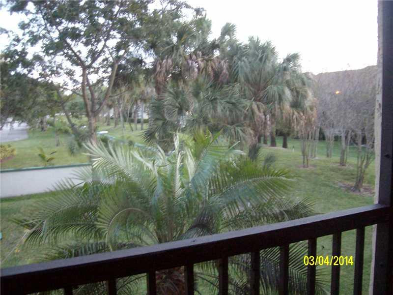 4435 Northwest 22nd Road, Unit 418 Coconut Creek, FL 33066 - Photo 10 of 15 Patio/Deck