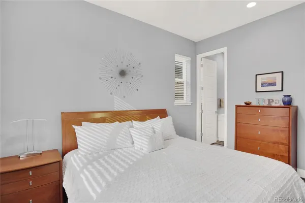 a bedroom with a bed and closet