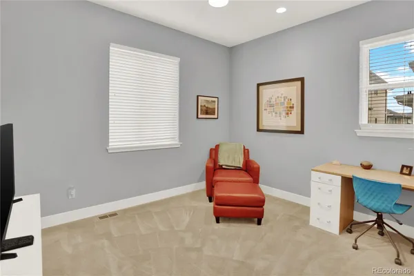 a room with furniture and a window