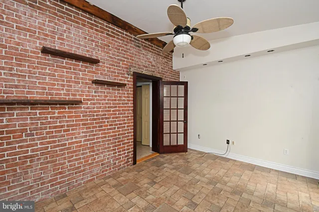 a view of a hallway with a window