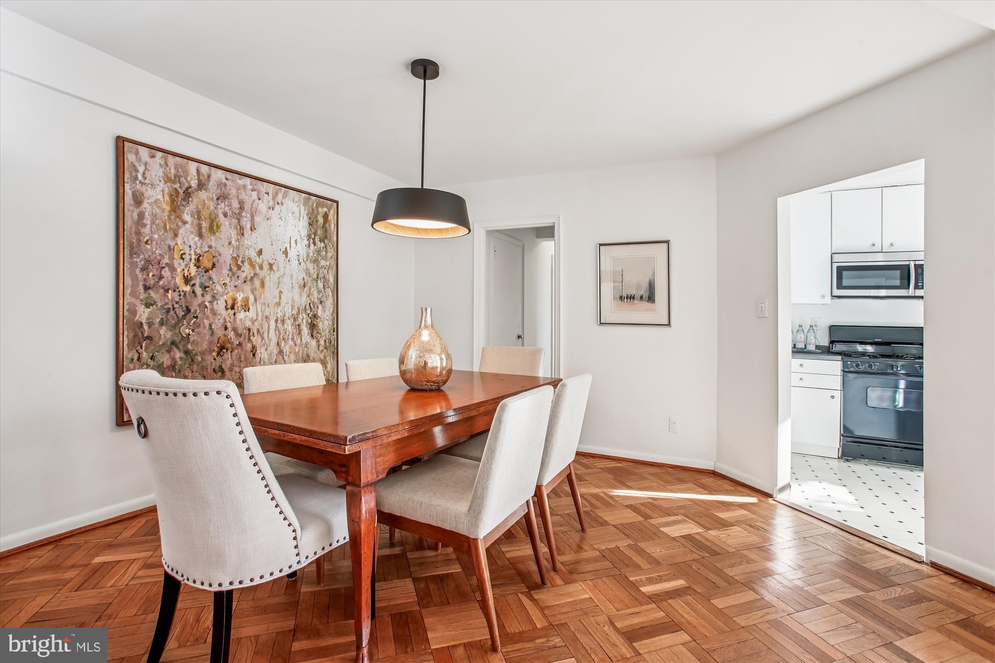 2500 Q Street Northwest, Unit 112 Washington, DC 20007 - Photo 6 of 19 a dining room with furniture and window