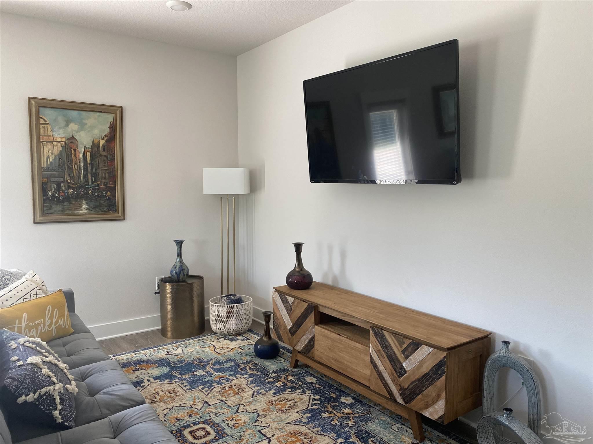9613 Nature Creek Boulevard Pensacola, FL 32526 - Photo 5 of 10 a living room with furniture