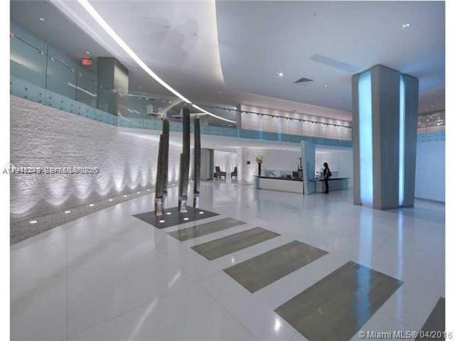 92 Southwest 3rd Street, Unit 2006 Miami, FL 33130 - Photo 11 of 13 a view of a room with gym equipment