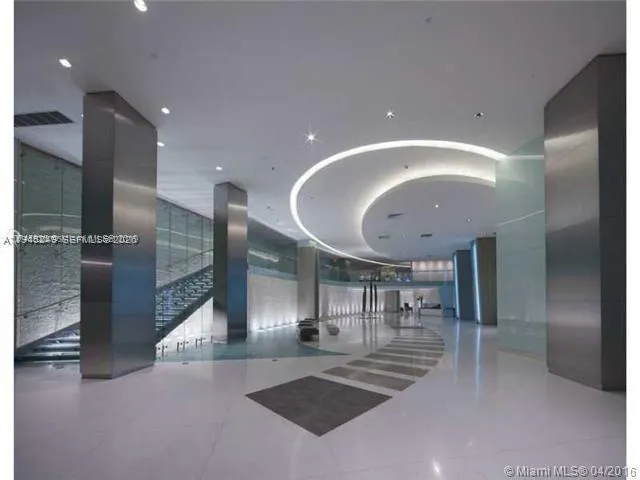 a view of swimming pool from a balcony