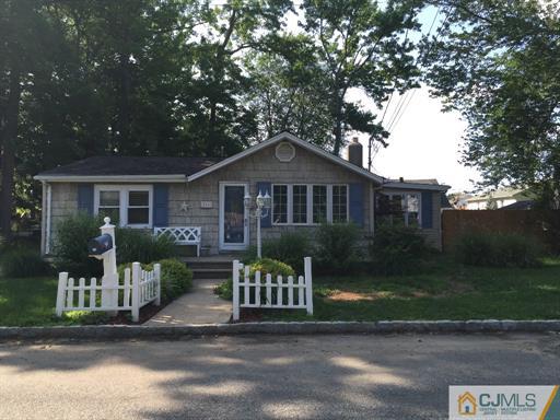 266 Raritan Boulevard Old Bridge, NJ 07735 - Photo 2 of 12 a front view of a house with garden