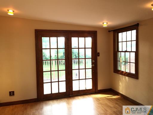 266 Raritan Boulevard Old Bridge, NJ 07735 - Photo 9 of 12 a view of an empty room with a window