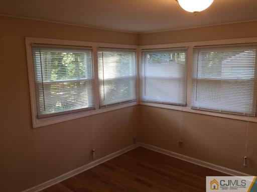 266 Raritan Boulevard Old Bridge, NJ 07735 - Photo 10 of 12 a view of a room that has a window in it