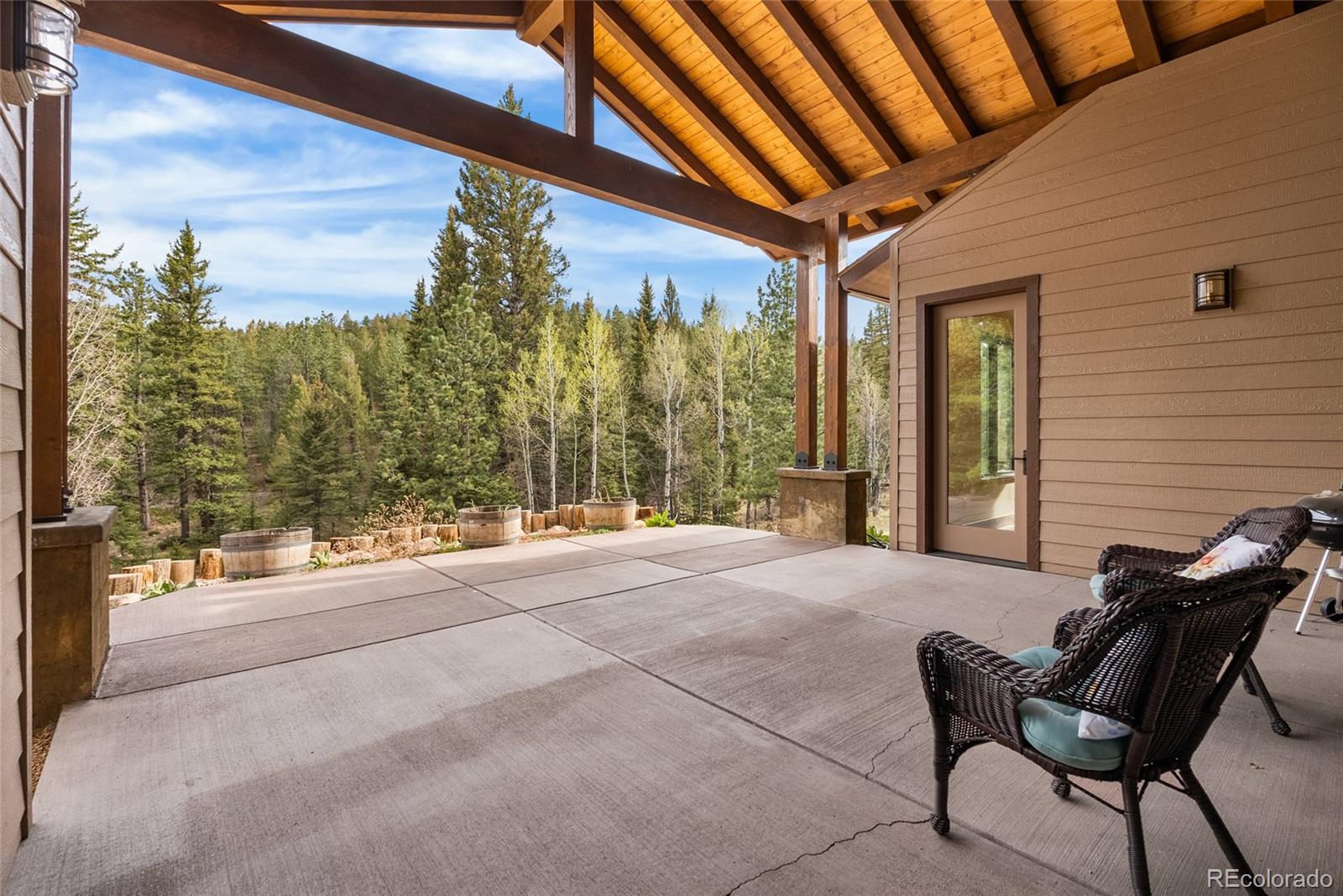 280 Double Tree Road Bailey, CO 80421 - Photo 36 of 43 a balcony with furniture and a shower
