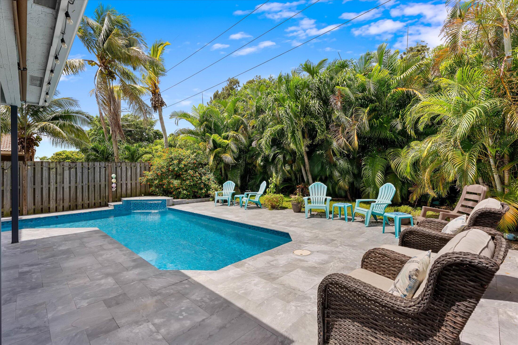 7061 Chesapeake Circle Boynton Beach, FL 33436 - Photo 18 of 51 a view of a backyard with swimming pool