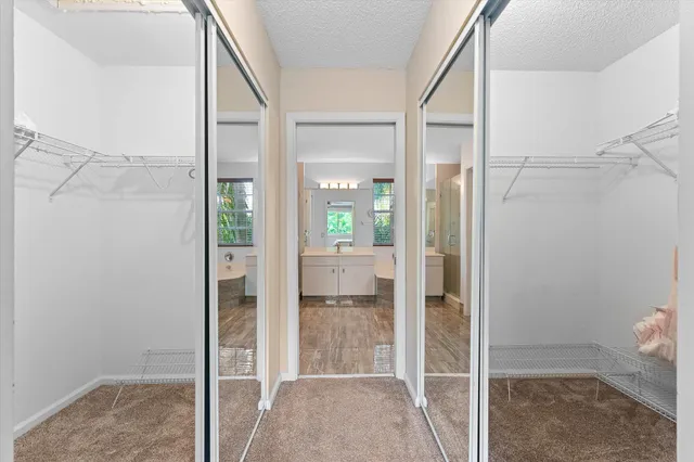 a bathroom with a glass shower door