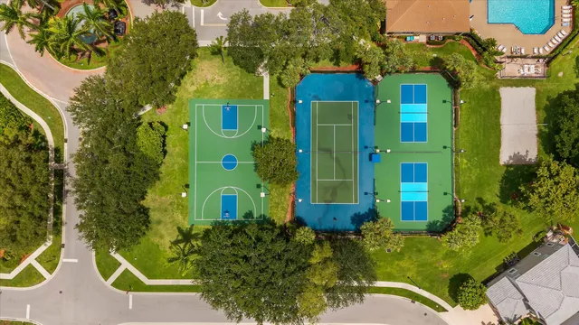 an aerial view of a house with outdoor space