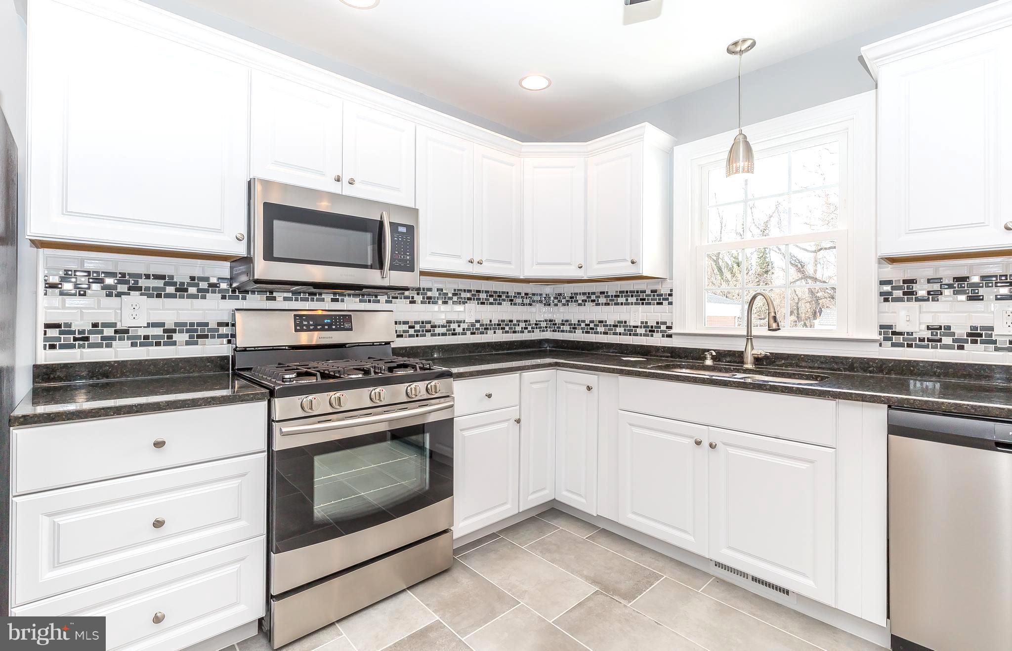 1718 Lynch Road Baltimore, MD 21222 - Photo 2 of 30 GRANITE,MOSAICS, 5-BURNER STOVE,RECESSED LIGHTING!