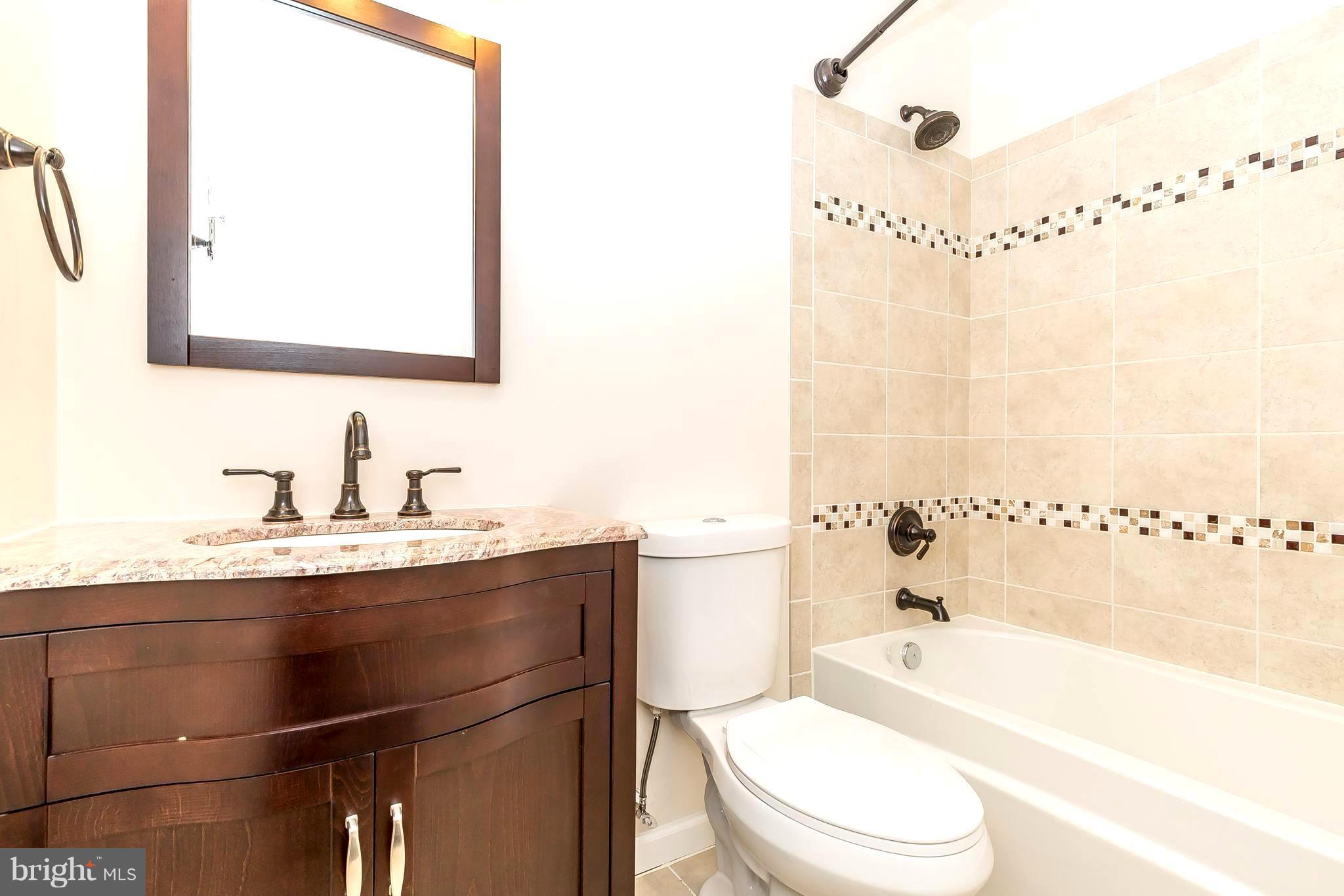 1718 Lynch Road Baltimore, MD 21222 - Photo 4 of 30 BEAUTIFUL NEW MAIN FLOOR BATH!