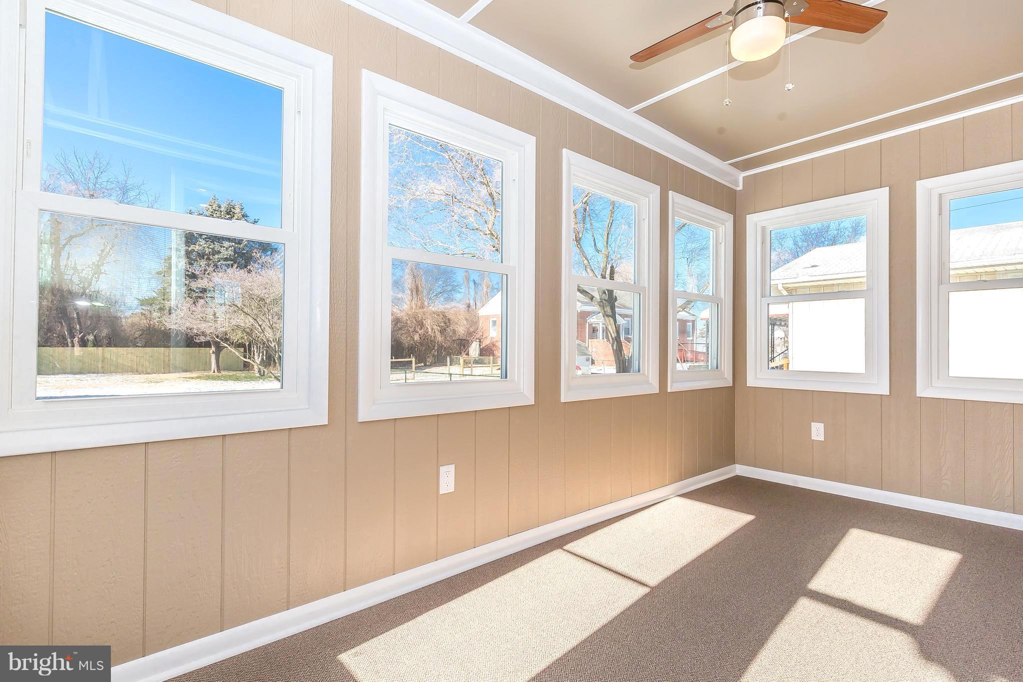 1718 Lynch Road Baltimore, MD 21222 - Photo 7 of 30 ENJOY THIS BRIGHT ENCLOSED SUNPORCH w/NEW WINDOWS!