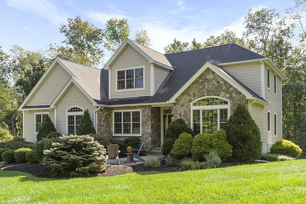 3 Squareshire Road Sterling, MA 01564 - Photo 2 of 42 a front view of a house with a yard