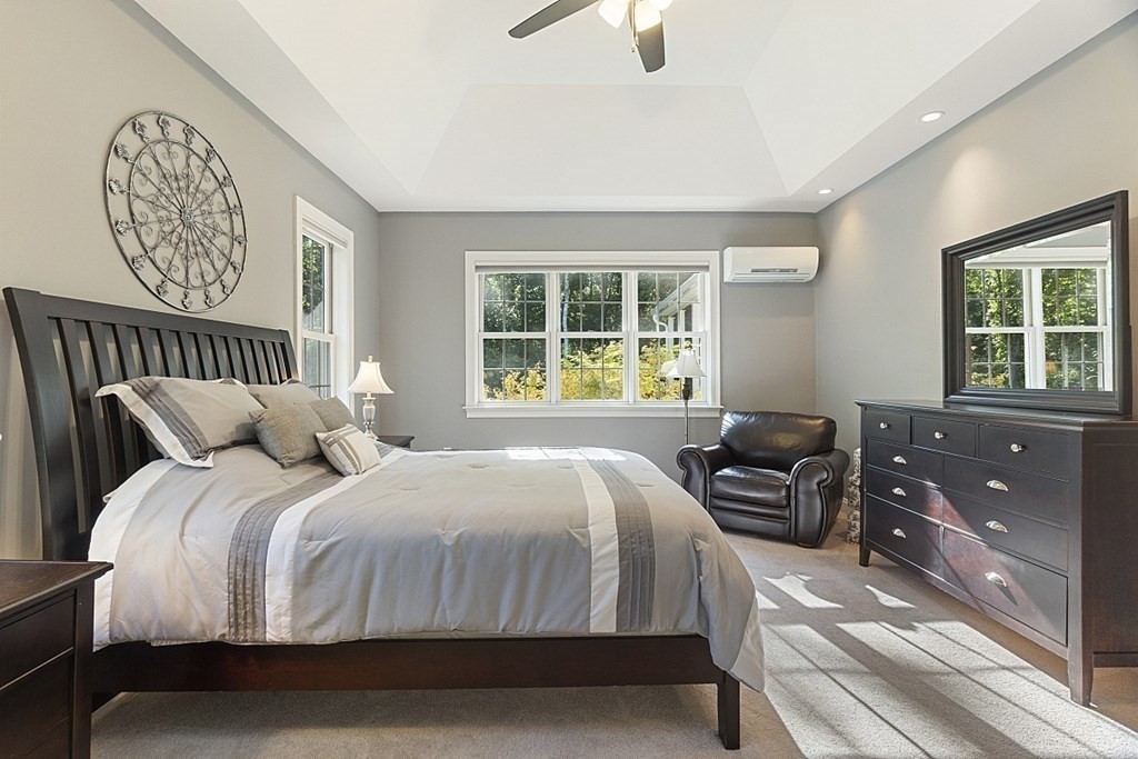 3 Squareshire Road Sterling, MA 01564 - Photo 24 of 42 a bedroom with a bed couches chair and a large window