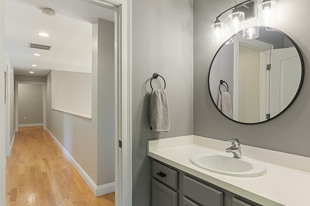 3 Squareshire Road Sterling, MA 01564 - Photo 31 of 42 a bathroom with a sink and a mirror