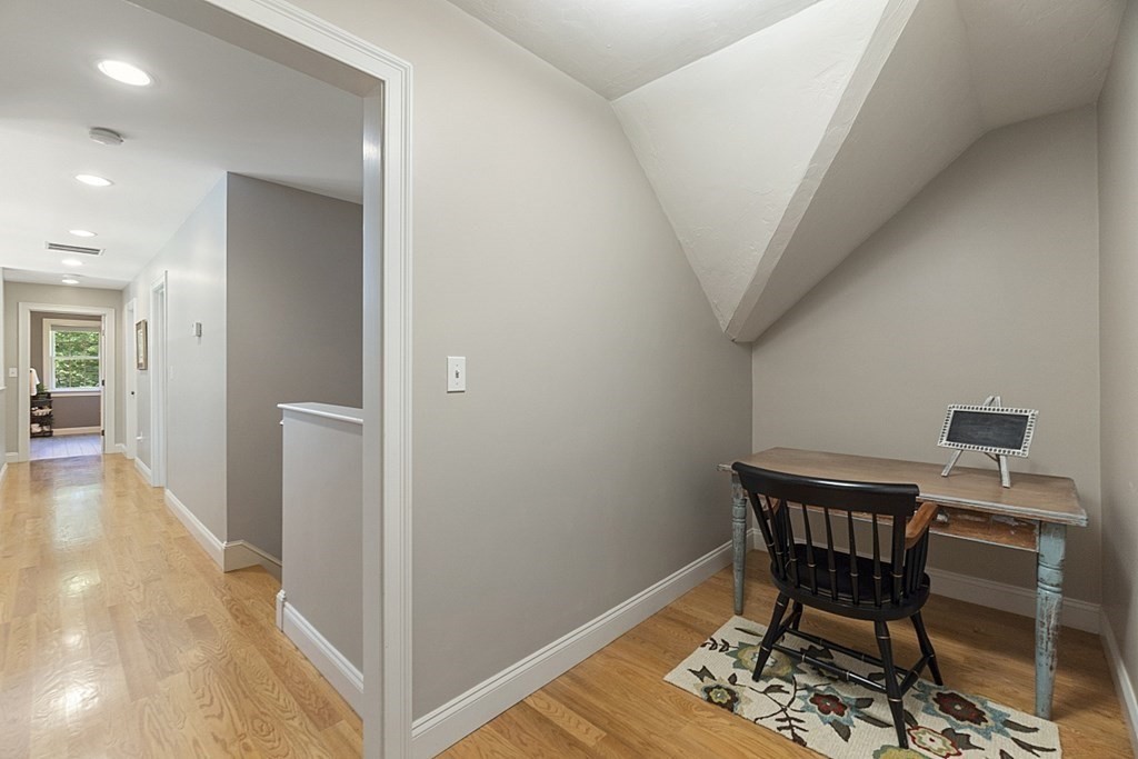 3 Squareshire Road Sterling, MA 01564 - Photo 34 of 42 a view of a hallway to a livingroom with furniture and wooden floor