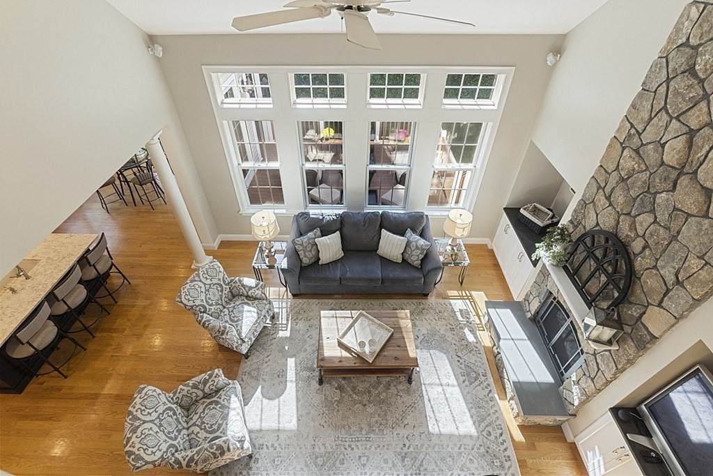 3 Squareshire Road Sterling, MA 01564 - Photo 35 of 42 a living room with furniture and a floor to ceiling window