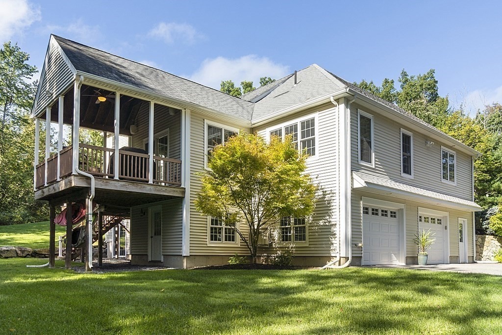 3 Squareshire Road Sterling, MA 01564 - Photo 41 of 42 a front view of a house with a yard