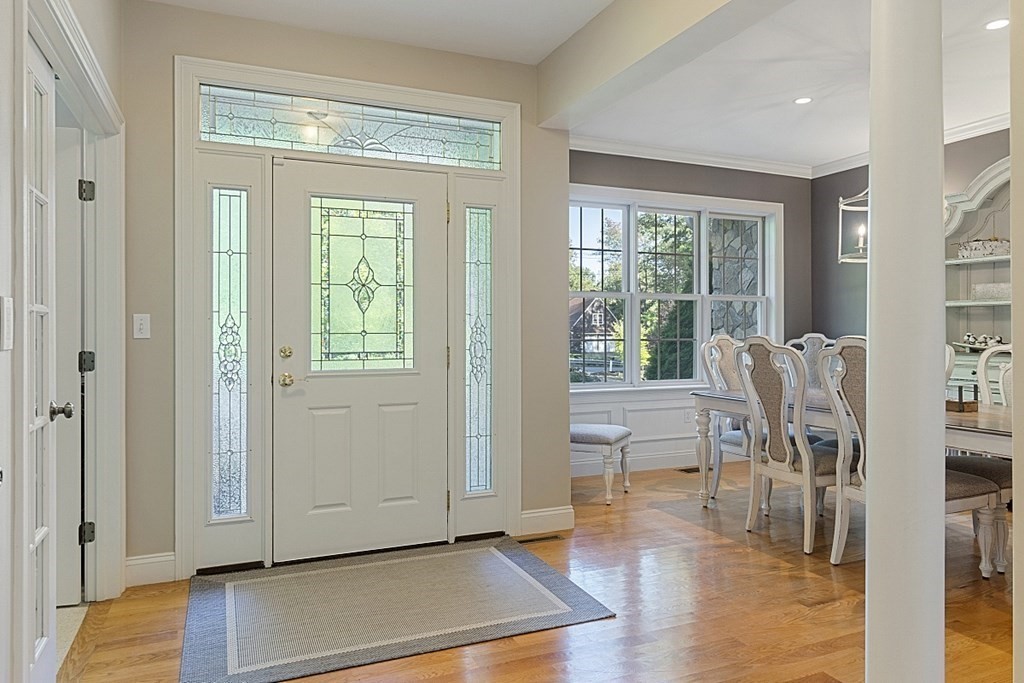 3 Squareshire Road Sterling, MA 01564 - Photo 5 of 42 a view of an empty room with wooden floor and a window