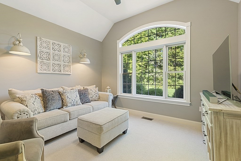 3 Squareshire Road Sterling, MA 01564 - Photo 6 of 42 a living room with furniture and a flat screen tv