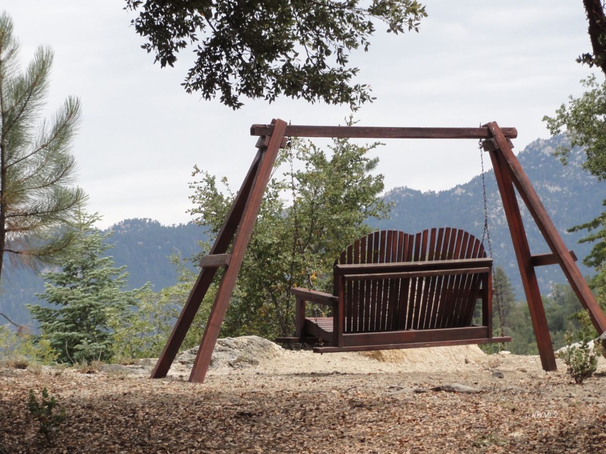 24810 Old Banning Road Idyllwild, CA 92549 - Photo 3 of 22 a view of balcony with wooden fence and floor